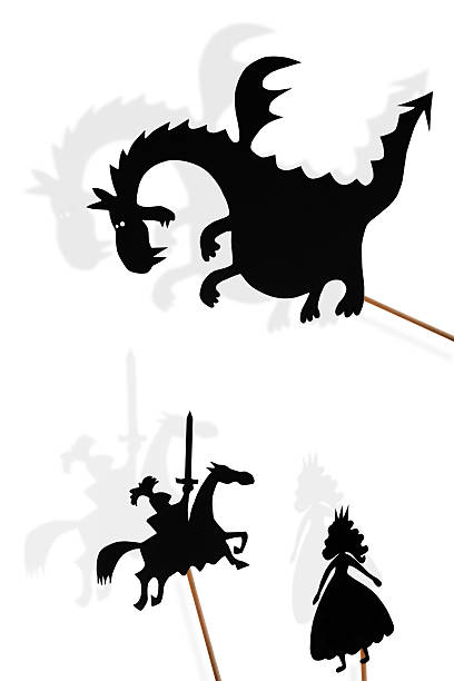 istock Shadow puppets of dragon, princess and knight on white background. 597635404