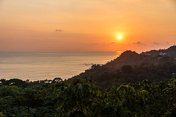 istock Sunset at Manuel Antonio, Costa Rica - tropical pacific coast 597637660