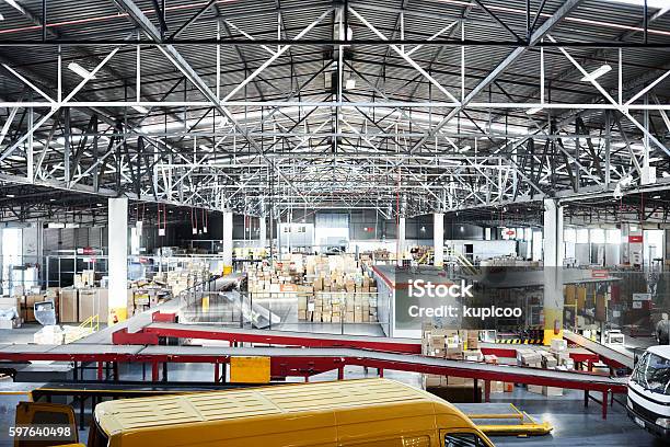 Shipping Is A Large Scale Operation Stock Photo - Download Image Now - Warehouse, Distribution Warehouse, Freight Transportation