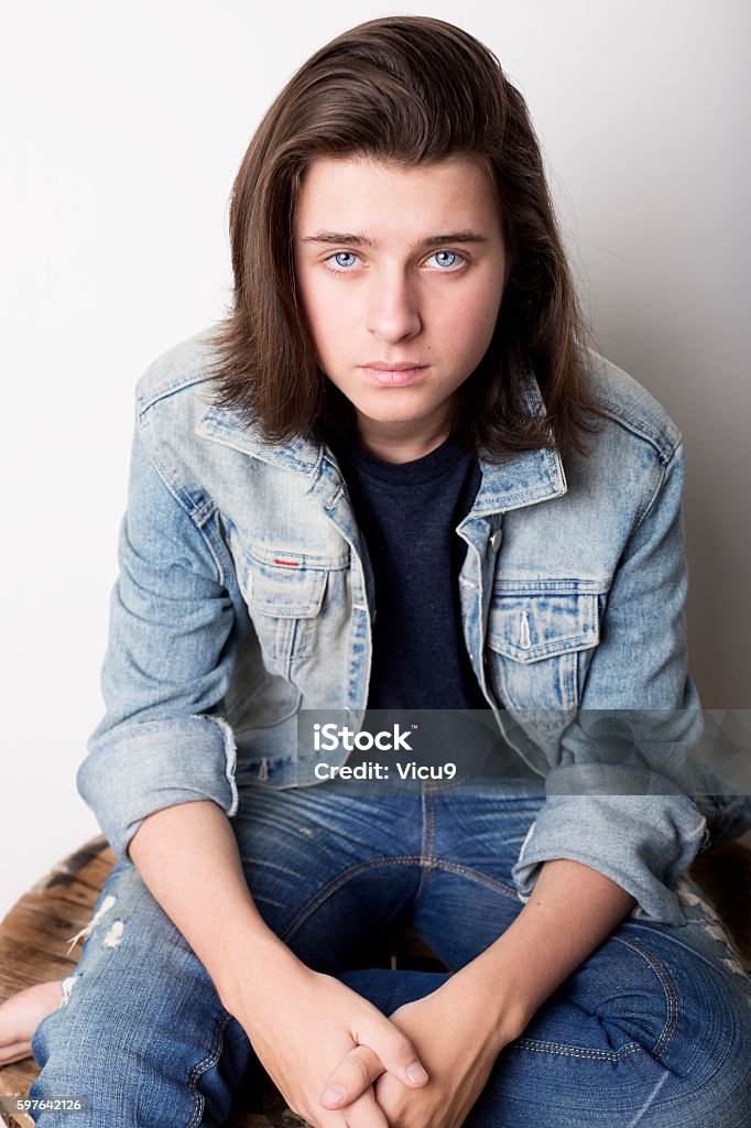 Fashion portrait of a teenager wearing jeans jacket Fashion portrait of a teenager Adult Stock Photo