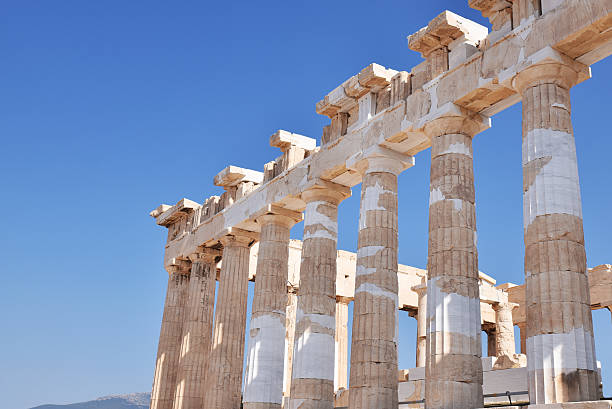 istock Columns of propylaea in Acropolis Greece on blue sky background 597642618