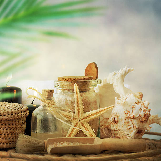 istock Spa and wellness setting with natural bath salt, candles 597642848