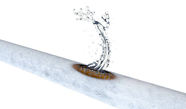 bursted frozen copper pipe with water leaking out