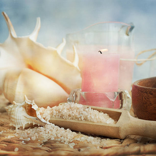 istock Spa and wellness setting with natural bath salt, candles 597643068