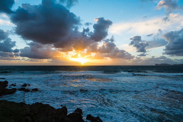 istock dramatic sky and rough sea at sunset 597646914
