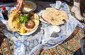 Traditional Persian Lunch on the carpet in Iran