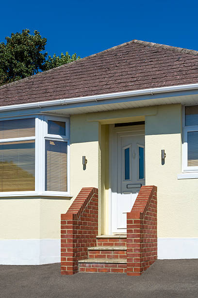 istock Small Bungalow Home - Front Door Detail 597649334