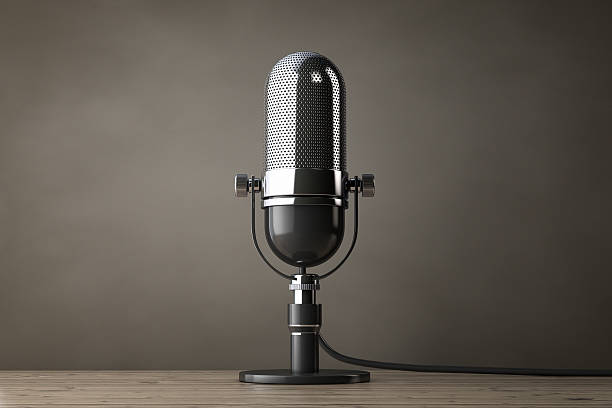istock Old Style Photo. Vintage Silver Microphone. 3d Rendering 597649628