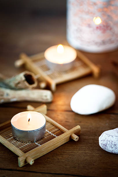 istock Spa background with candles and treatment products 597653418