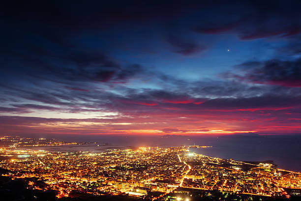 istock city with a night on the beach 597655320