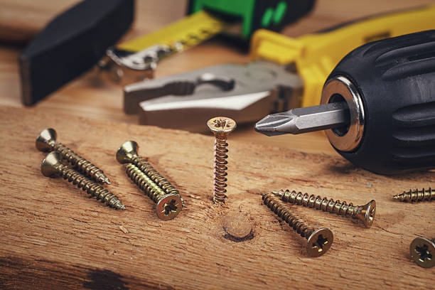 istock Wood screws and carpentry tools 597656050