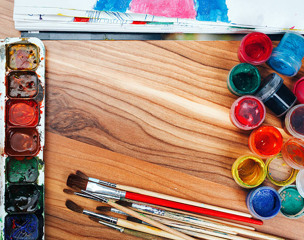 istock watercolor paints and brushes 597656178
