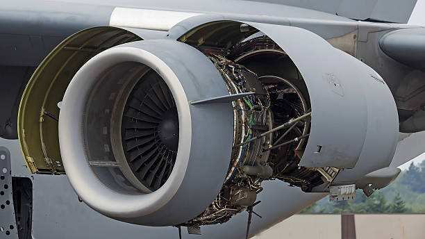 istock Airplane jumbo jet propulsion engine maintenance 597656854