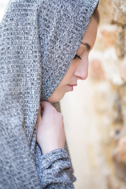 istock Young Woman Praying 597657334