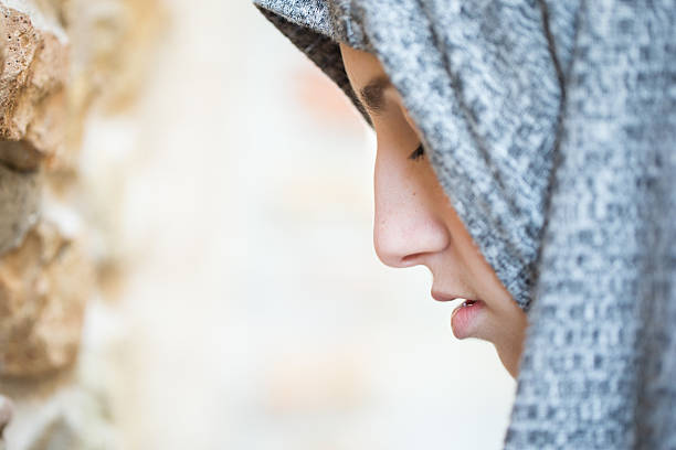istock Young Woman Praying 597657412