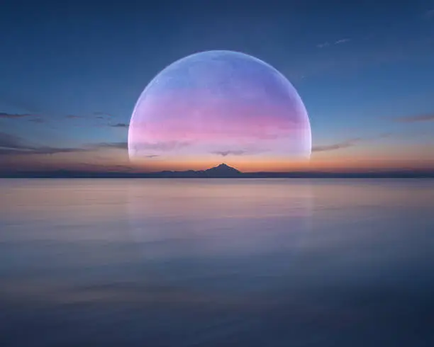Photo of Pink planet like moon above the ocean and mountain