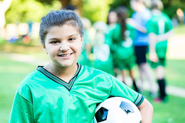 istock Tired soccer player smiles after winning game 597659690