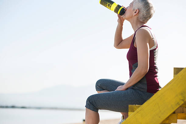 istock Beautiful senior woman exercise 597659800