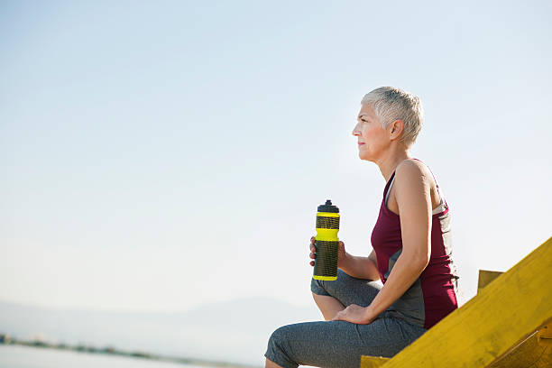 istock Beautiful senior woman exercise 597659932