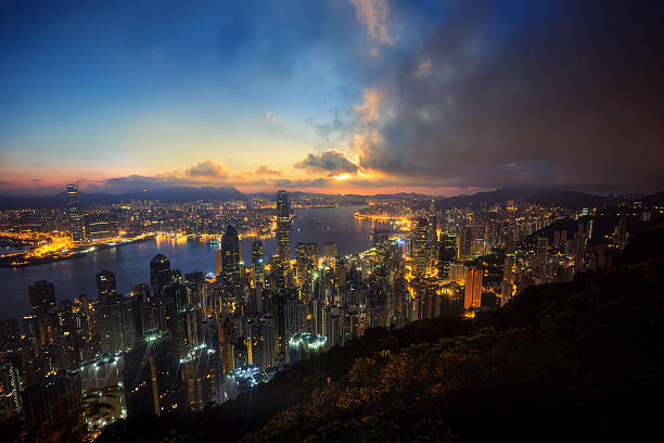 istock Night cityscape sunset in Hongkong 597660324