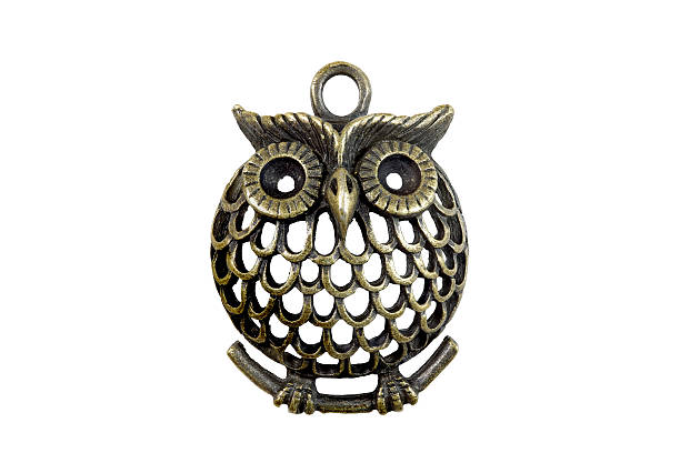 istock Quilt tool : Owl keyring isolated on white background 597661048