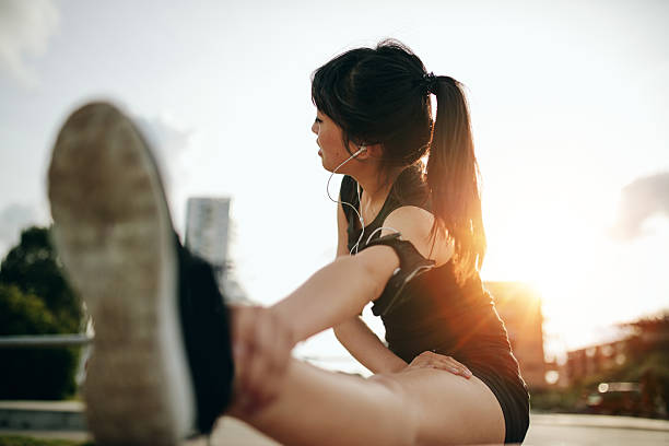 istock Female runner exercising in morning. 597663966