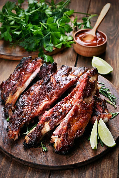 istock Grilled sliced barbecue pork ribs 597664900