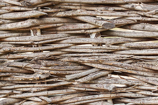 istock Texture of wicker fence - the idea  a simple natural 597665182