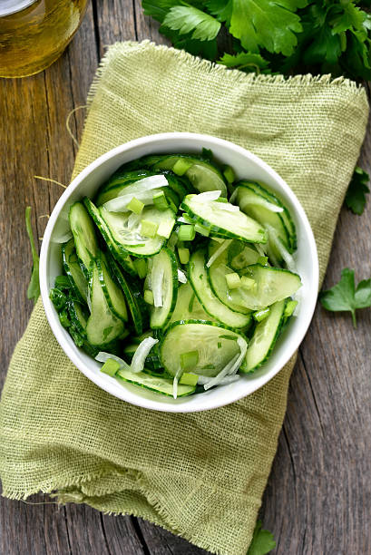 istock Salad from cucumber, top view 597665348