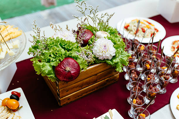 istock Decor of natural vegetables and fruit on a table 597666010