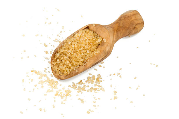 istock wooden scoop wth brown sugar 597666042
