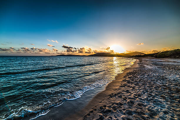 istock clear sky over the shore at sunset 597666062