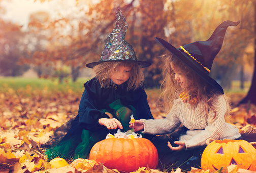 Little girls dressed as witch at Halloween