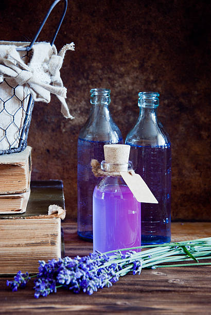 istock Lavender flowers, lavender essential and old books 597669208