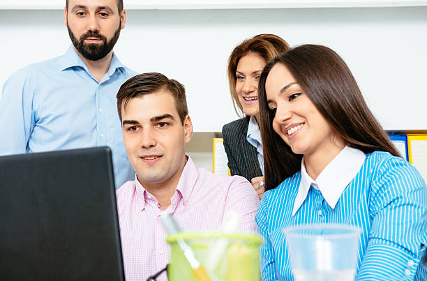 istock Business meeting with young professionals dealing with project challenges 597671826