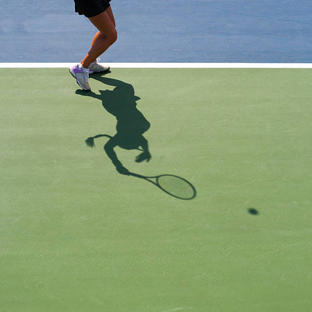 istock Tennis serve silhouette 597672594