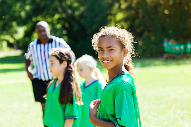 istock Happy African American soccer player prepares for game 597672854