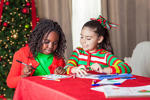 istock Diverse friends are creative during Christmas charity project 597673698