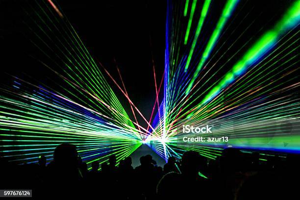 Laser Show Rays Stream In Disco Party Nightlife Stock Photo - Download Image Now - Exhibition, Laser, Performance
