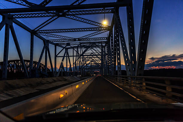istock Evening Twilight Car Traffic on Hudson River Crossing Expressway Bridge 597926752