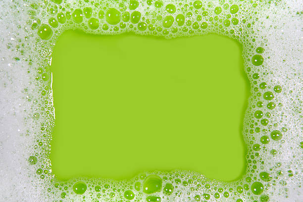Soap sud frame (green) Frame made of soap sud with water in green tones. Much space for copy inside. soap sud foam bubble laundry stock pictures, royalty-free photos & images