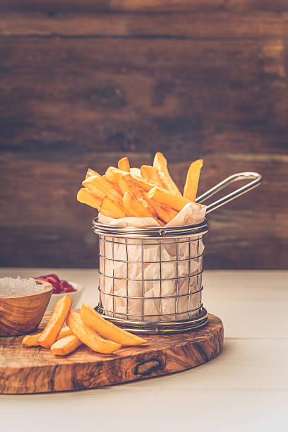 istock French fries in a basket 597928404