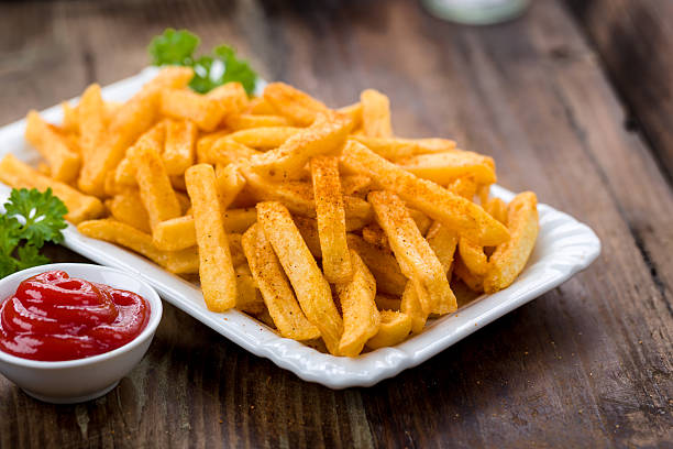 istock French fries in a bowl 597928430