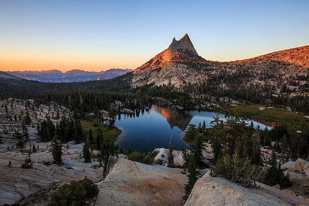 Cathedral Peak and Upper Lake stock photo