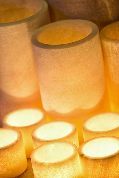 istock Soft focus of candlelight in cylindrical resin 597932120
