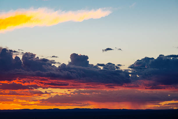 istock Dark Turbulent Sky with Storm Ominous Clouds at Sunset 597933496