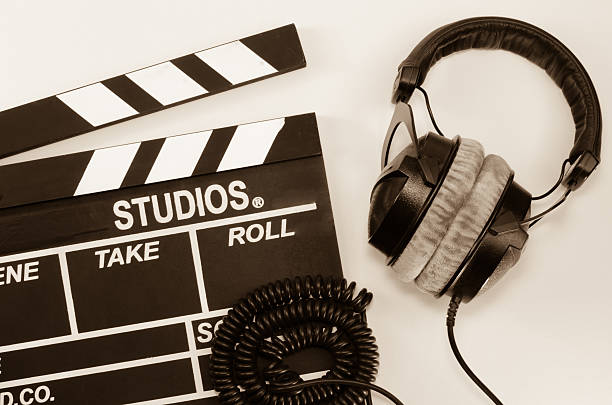 istock Slate film and headphone white backgroun 597934276