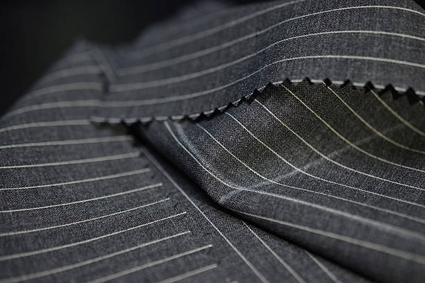 istock close up dark gray fabric of suit 597934724