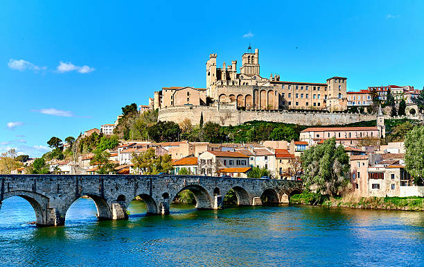Beziers town. France The old Arch Bridge and cathedral Saint-Nazaire in the Beziers town. Cathedral is the largest Gothic monument in the city. Built in the XIV century, It's a symbol of the city. Languedoc-Roussillon, France beziers stock pictures, royalty-free photos & images
