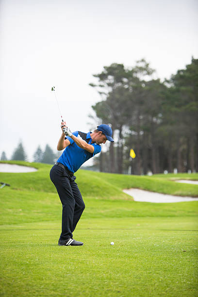 istock Golf shot off the fairway for the green 597937870